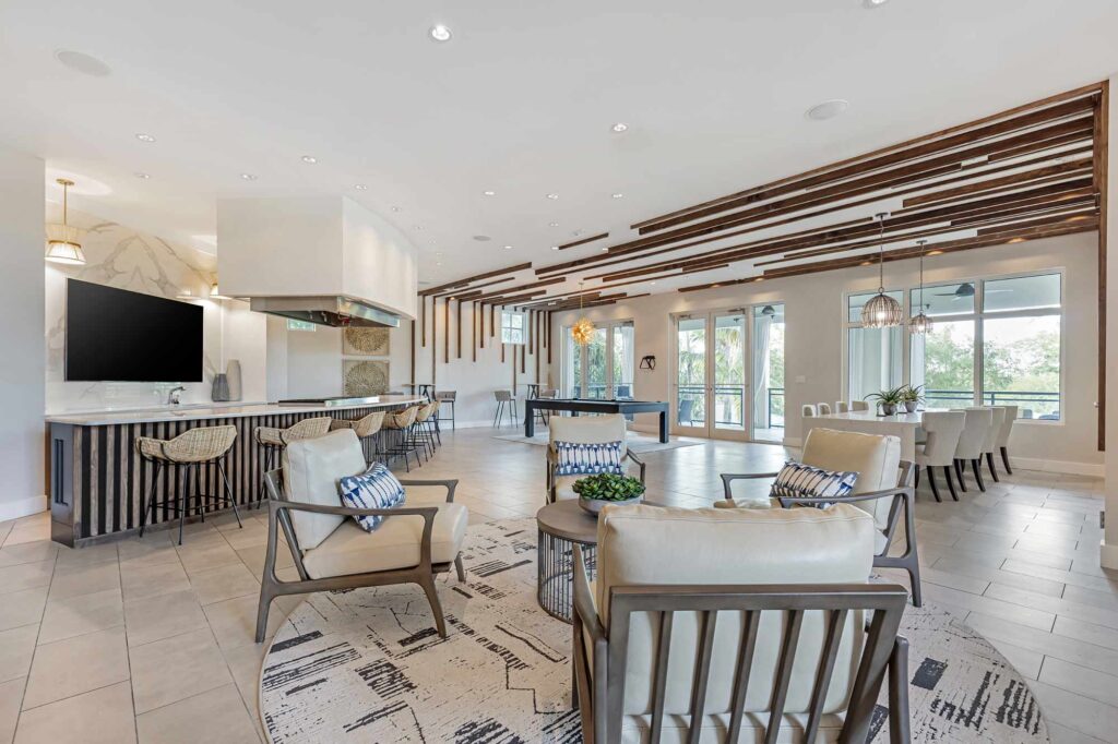 Clubhouse lounge with billiards table and demonstration kitchen