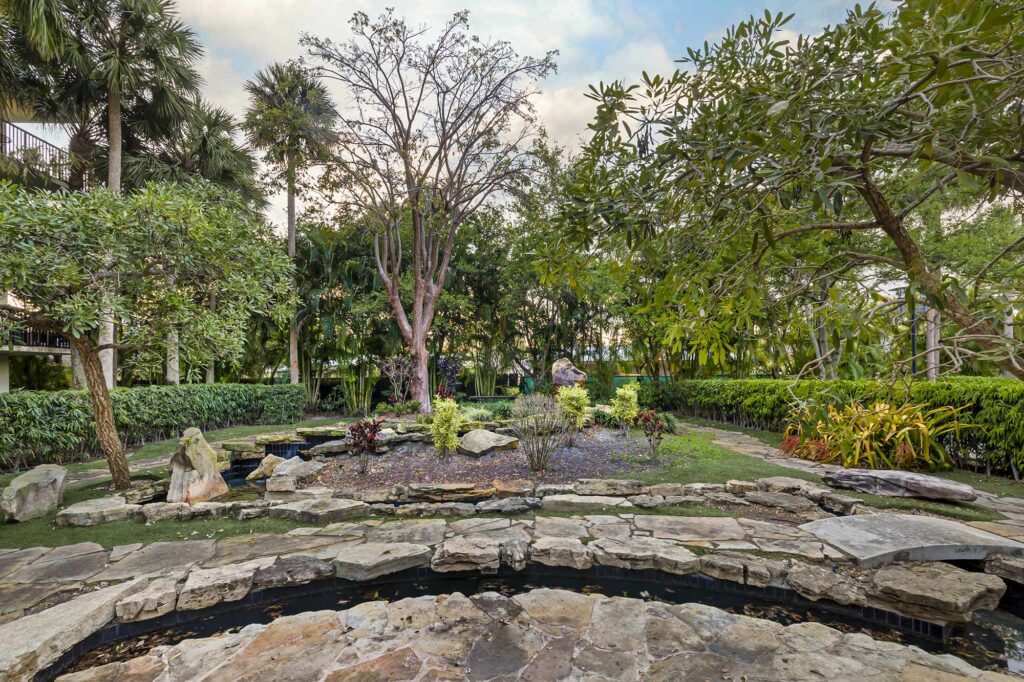 Courtyard with rock landscaping and small ponds